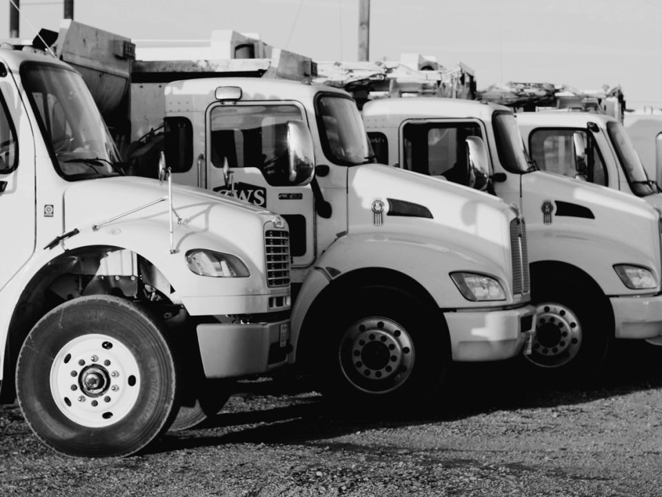 County Waste Service side view of trucks